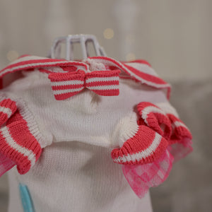 UVカットセーラーニットワンピース ピンク ディテールのクローズアップ